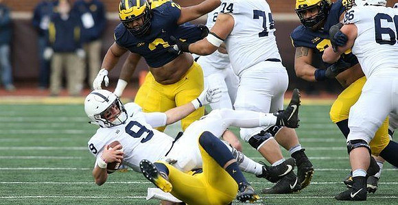 Chase Winovich (15) and Carlo Kemp (2)
