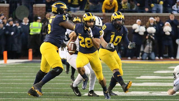 Aubrey Solomon (5), Brandon Watson (28), and Devin Bush (10)