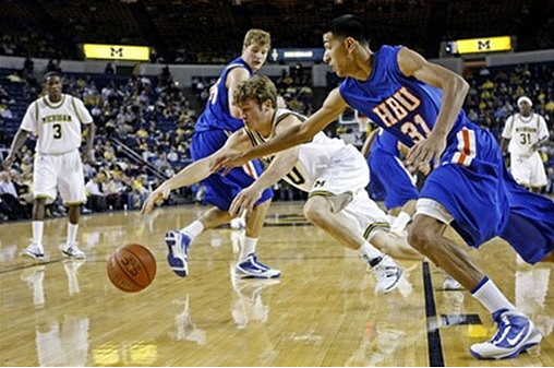 Manny Harris (3), Zack Novak (0), and Laval Lucas-Perry (31)