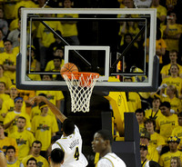 Darius Morris (4) and Manny Harris (3)