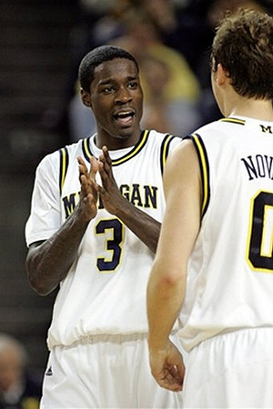 Manny Harris (3) and Zack Novak (0)