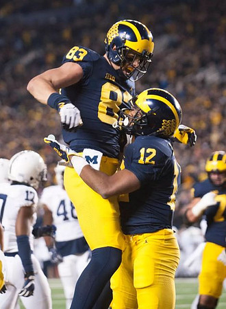 Zach Gentry (83) and Chris Evans (12)