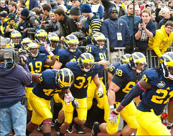 Charlie Zeller (19), J.B. Fitzgerald (42), Steve Watson (84), Jared Van Slyke (31), Tom Pomarico (91), Joe Kerridge (36), Mike Martin (68), and Junior Hemingway (21)