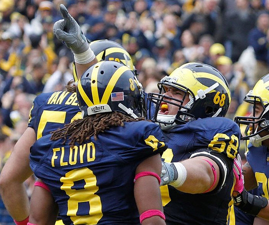Ryan Van Bergen (53), J.T. Floyd (8), Mike Martin (68), and Thomas Gordon (30)