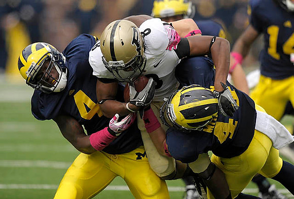 Cameron Gordon (4), Desmond Morgan (44), and Josh Furman (14)