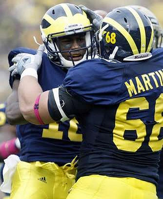 Blake Countess (18) and Mike Martin (68)