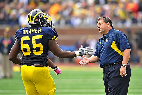 Patrick Omameh (65) and Brady Hoke