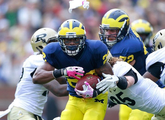 Fitzgerald Toussaint (28) and Mark Huyge (72)