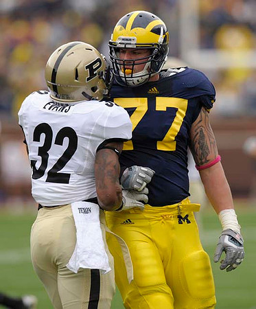 Taylor Lewan (77)