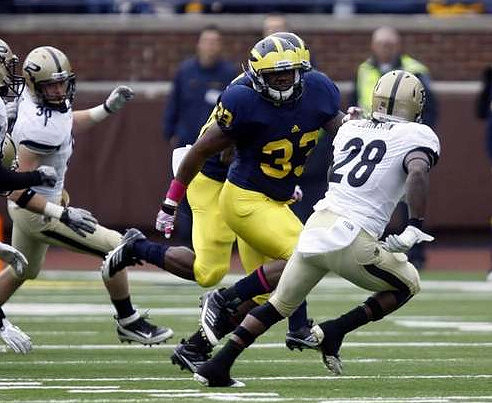 Fitzgerald Toussaint (28) and Stephen Hopkins (33)