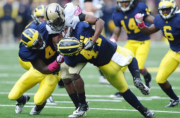 Cameron Gordon (4), Desmond Morgan (44), Josh Furman (14), and Raymon Taylor (6)