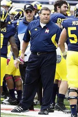Brady Hoke, Craig Roh (88), and David Molk (50)