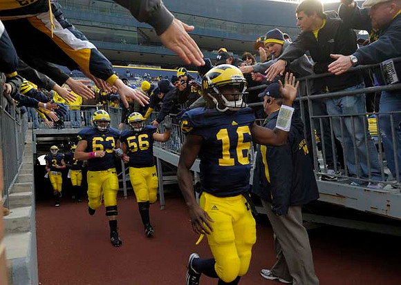 Russell Bellomy (3), Devin Gardner (7), Rocko Khoury (63), Joey Burzynski (56), and Denard Robinson (16)