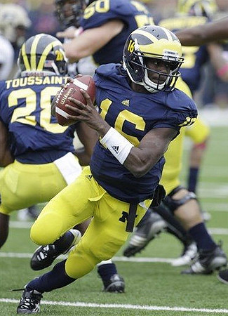 David Molk (50), Denard Robinson (16), and Fitzgerald Toussaint (28)