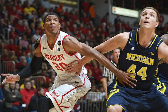 Nik Stauskas (11) and Trey Burke (3)