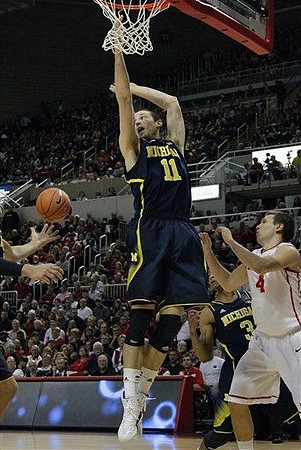 Nik Stauskas (11) and Trey Burke (3)