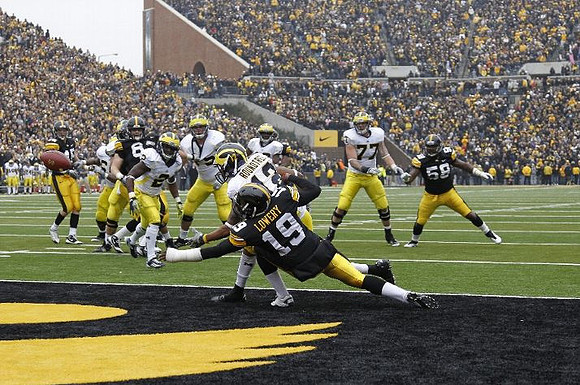 Roy Roundtree (12), Vincent Smith (2), Mark Huyge (72), Denard Robinson (16), and Taylor Lewan (77)