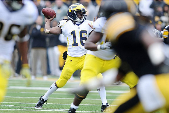 Denard Robinson (16) and Patrick Omameh (65)