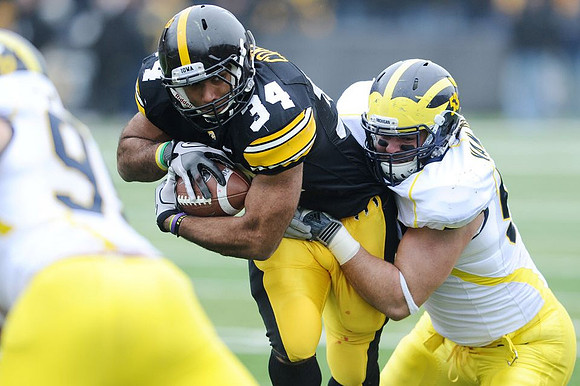 Jake Ryan (90) and Ryan Van Bergen (53)