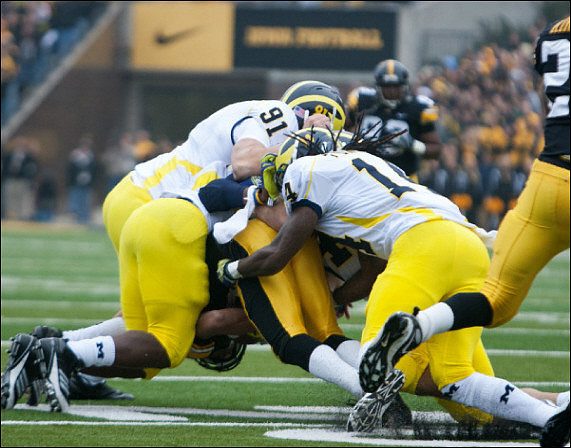 Tom Pomarico (91) and Josh Furman (14)