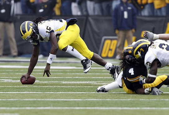 Denard Robinson (16) and Vincent Smith (2)