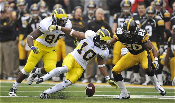 Kevin Koger (86) and Jeremy Gallon (10)
