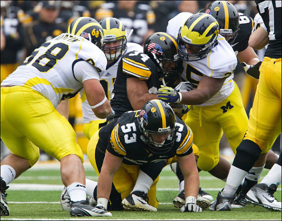 Mike Martin (68) and Kenny Demens (25)
