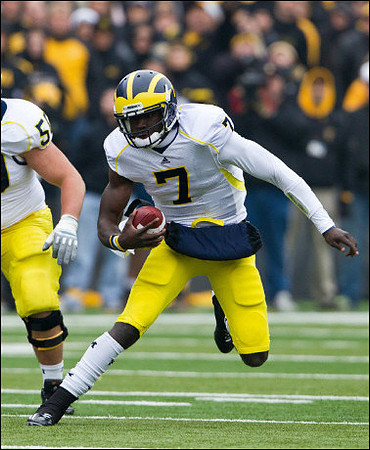 David Molk (50) and Devin Gardner (7)