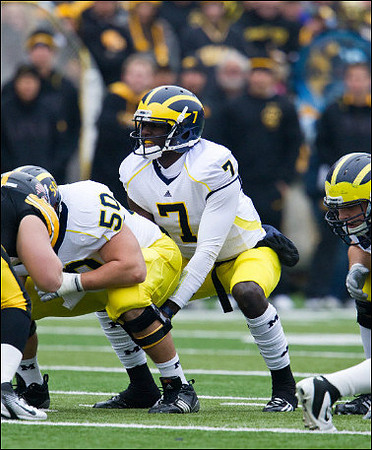 David Molk (50) and Devin Gardner (7)