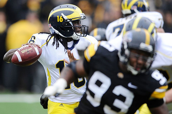 Denard Robinson (16) and Taylor Lewan (77)