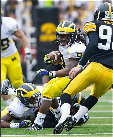 Michael Cox (15) and Martavious Odoms (9)