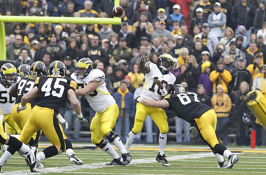 David Molk (50), Michael Schofield (75), and Denard Robinson (16)