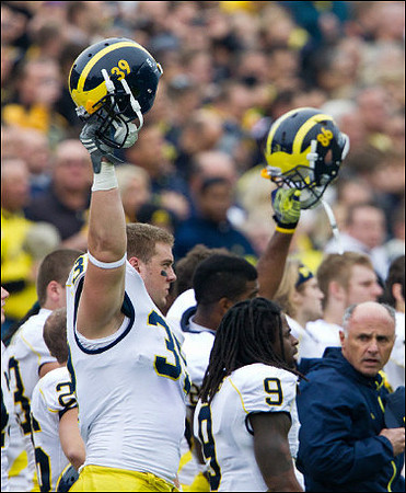 Will Heininger (39), Kevin Koger (86), and Martavious Odoms (9)