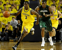 DeShawn Sims (34) and Zack Novak (0)