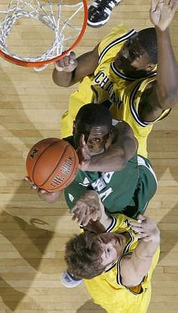Zack Novak (0) and DeShawn Sims (34)