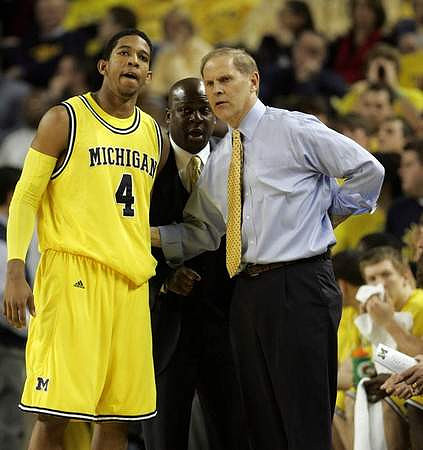 Darius Morris (4) and John Beilein