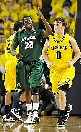 Darius Morris (4) and Zack Novak (0)