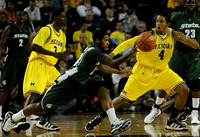 Manny Harris (3) and Darius Morris (4)