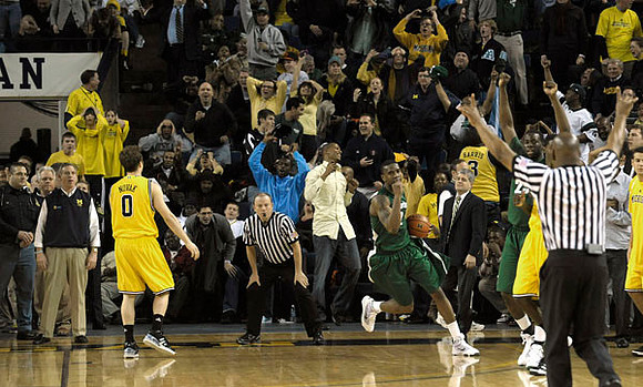 Zack Novak (0) and Manny Harris (3)