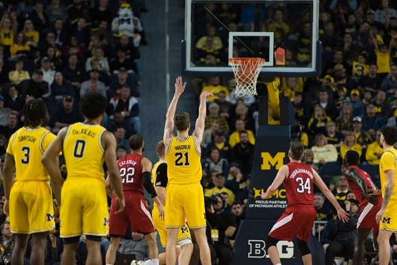 Zavier Simpson (3), David DeJulius (0), Austin Davis (51), Franz Wagner (21), and Brandon Johns Jr. (23)