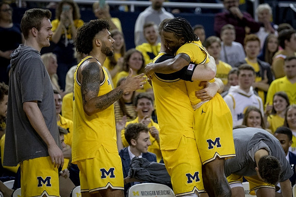 Jaron Faulds (44), Isaiah Livers (2), Austin Davis (51), Zavier Simpson (3), and Colin Castleton (11)
