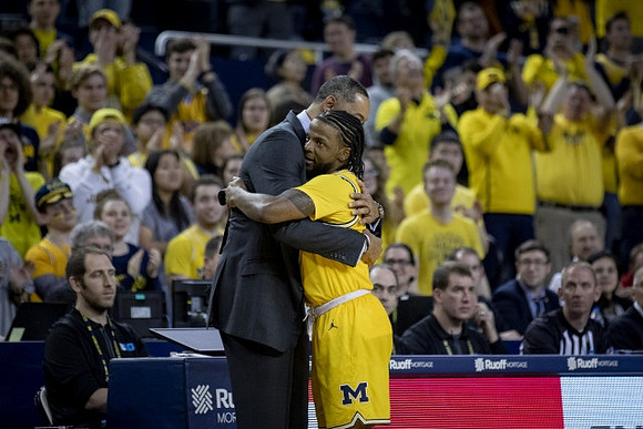 Juwan Howard and Zavier Simpson (3)