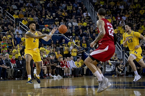 Isaiah Livers (2) and Brandon Johns Jr. (23)