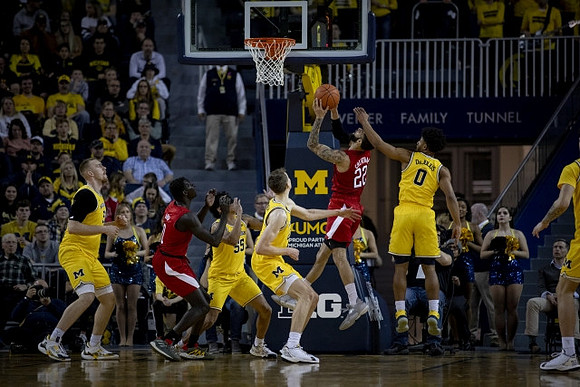 Austin Davis (51), Eli Brooks (55), Franz Wagner (21), and David DeJulius (0)