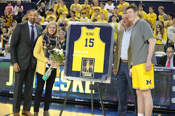 Juwan Howard and Jon Teske (15)