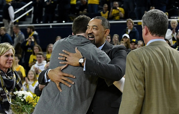Jon Teske (15) and Jim Harbaugh