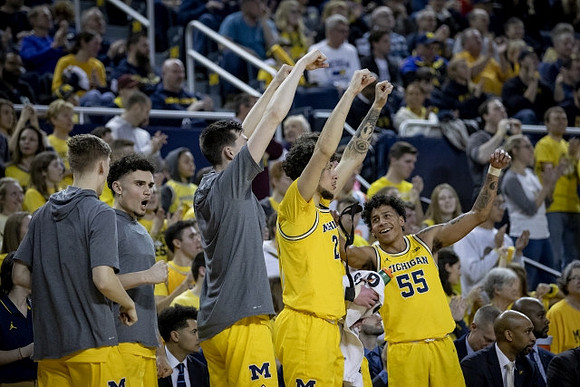 Cole Bajema (22), Adrien Nunez (5), Colin Castleton (11), Brandon Johns Jr. (23), Eli Brooks (55), and Saddi Washington