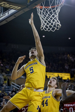 Adrien Nunez (5) and Jaron Faulds (44)