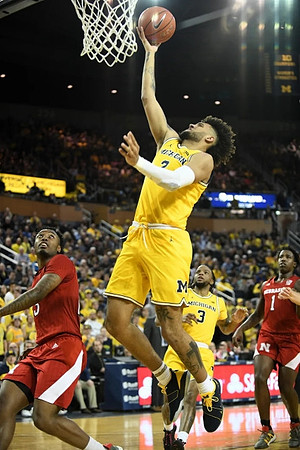 Zavier Simpson (3) and Isaiah Livers (2)