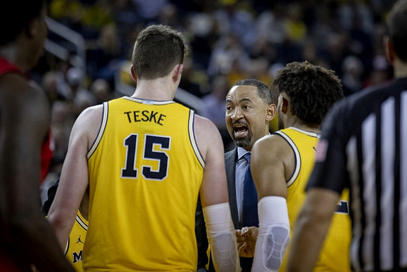 Jon Teske (15), Jim Harbaugh, and Isaiah Livers (2)